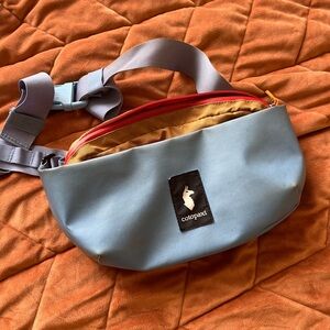 Cotopaxi purple and orange hip pack/fanny pack